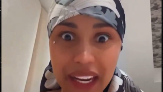 Cardi B addressing credit card thieves on livestream.