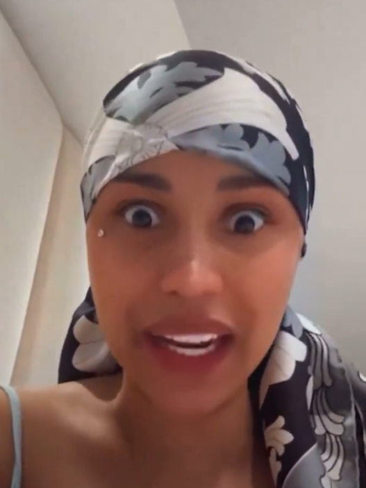 Cardi B addressing credit card thieves on livestream.