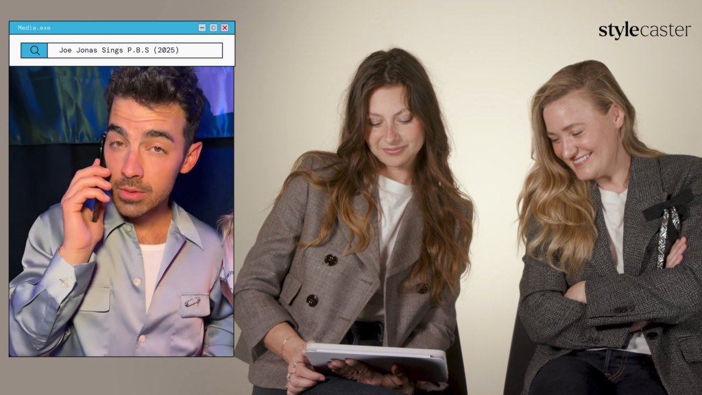 Three adults in a fashion studio: a man on a call in a left panel and two women in blazers reviewing documents to the right, StyleCaster logo visible.