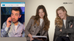 Three adults in a fashion studio: a man on a call in a left panel and two women in blazers reviewing documents to the right, StyleCaster logo visible.