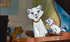Three playful cartoon cats on a wooden windowsill: a white cat with a gold collar, a white kitten with a pink bow, and an orange cat.