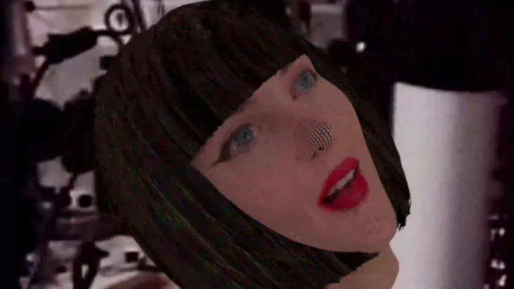Close-up of a doll's face with dark hair and red lipstick, angled to the side against a blurred background.