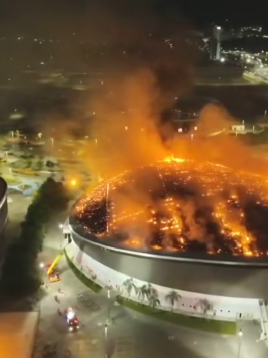 Firefighters battling flames at Rio’s Olympic Park Velodrome.