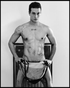 Gabriele Esposito photographed with a shaved head by Tommaso Aprilino.