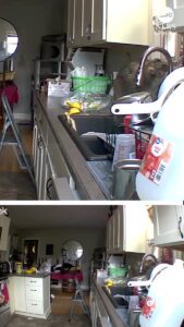 Cluttered kitchen with white cabinets, a stainless sink, a green dish rack, and a step ladder in the center.