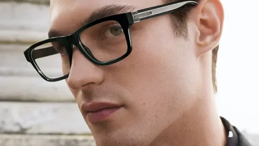 Close‑up of Kit Butler modeling D&G’s Spring–Summer 2026 eyewear.