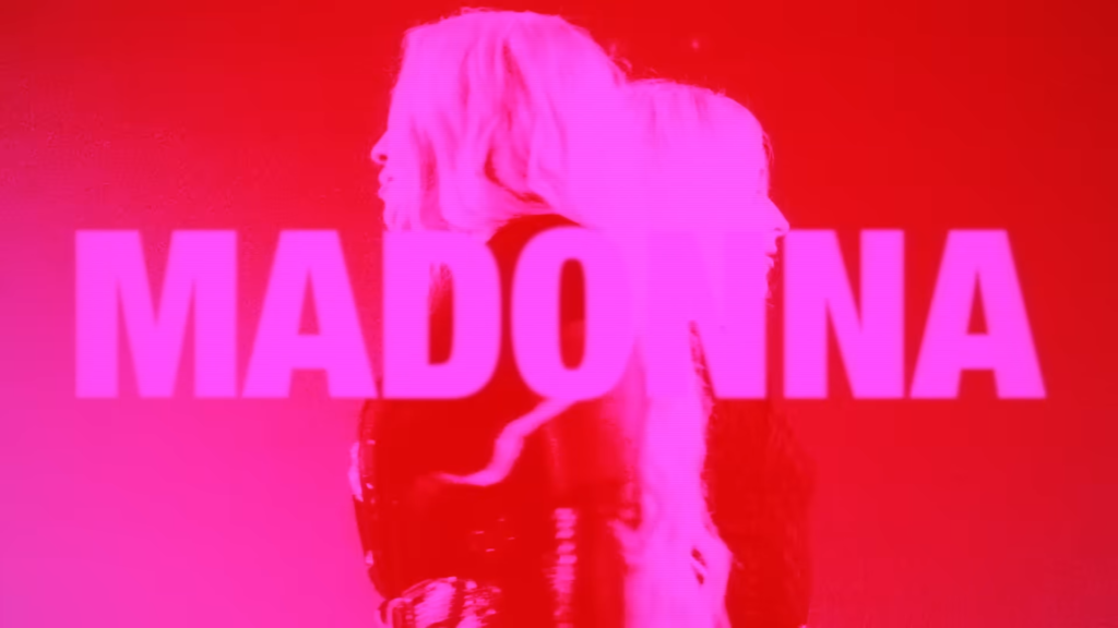 Promotional image of Madonna with a bold pink MADONNA text across a red gradient background, showing her side profile.