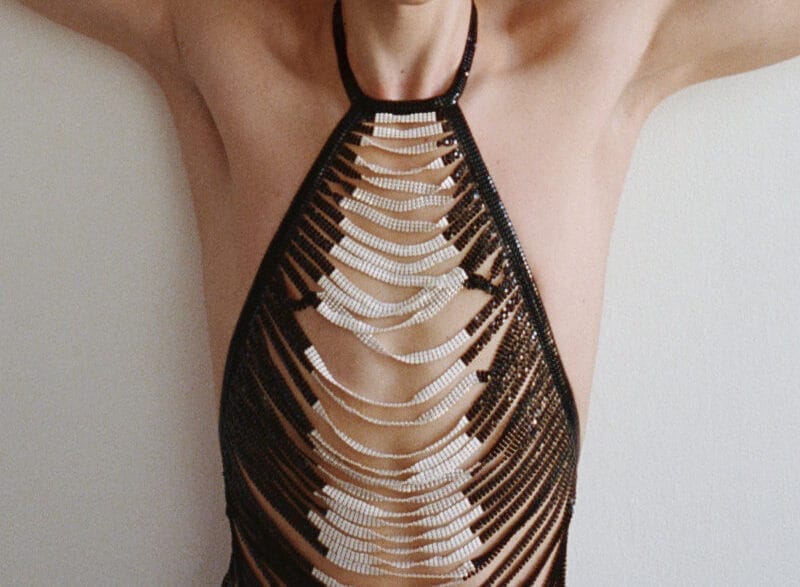 Model wearing a sensual, body‑forward look from Ludovic de Saint Sernin’s F/W 2026 collection.