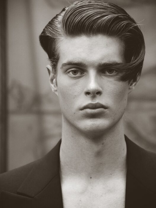 Model Wylie Brown photographed by Maurizio Montani in black‑and‑white and color.