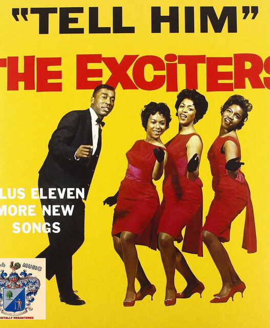 Bright yellow album cover for The Exciters with bold black 'TELL HIM' and red 'THE EXCITERS', showing a man in a suit and three women in red dresses posing together; small logo at bottom-left.