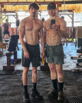 Miles Heizer and Angus O’Brien posing during a gym workout shared on Instagram Stories.