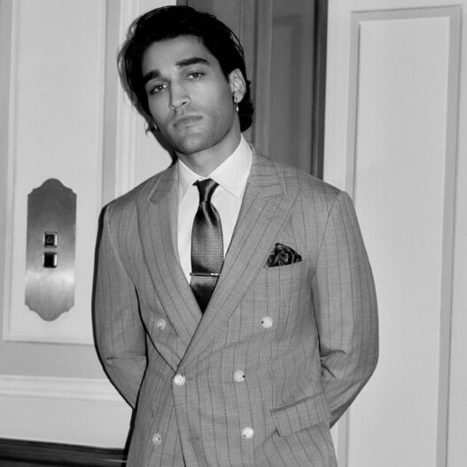 Actor Josh Heuston with Taemin Park and Hugh Laughton‑Scott wearing BOSS Made to Order suits.