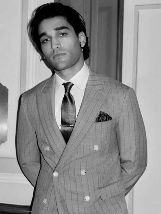 Actor Josh Heuston with Taemin Park and Hugh Laughton‑Scott wearing BOSS Made to Order suits.