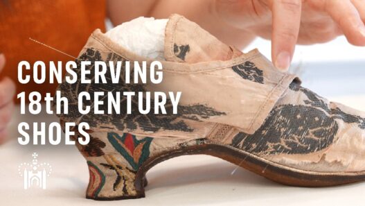 18th‑century pink silk‑covered heeled shoe from Historic Royal Palaces.