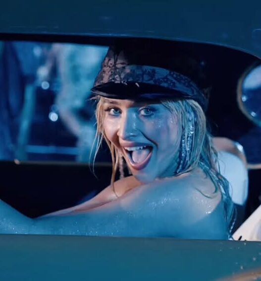 Sabrina Carpenter drives off her Coachella 2026 set wet and happy