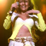 Thalía performing her 2000s Latin pop hits live.