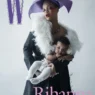 Rihanna wearing a purple hat and a white feathered scarf, holding her baby on a W magazine cover.
