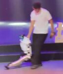 Humanoid robot malfunctioning mid‑dance during a performance to “Billie Jean”