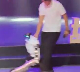 Humanoid robot malfunctioning mid‑dance during a performance to “Billie Jean”