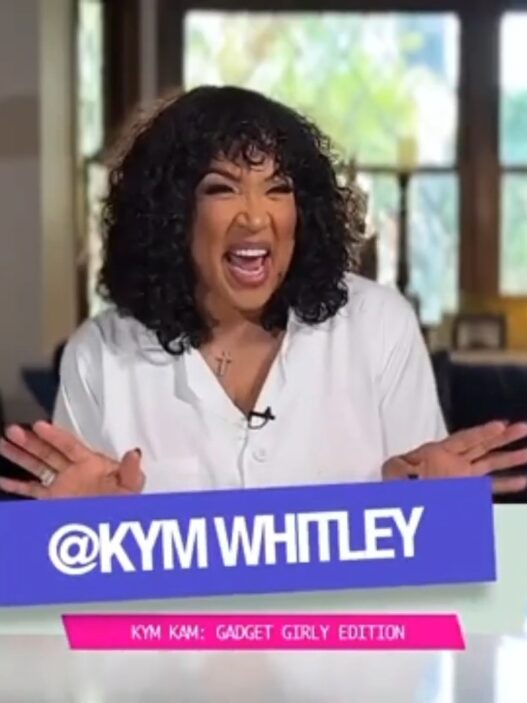 Kym Whitley testing a viral vacuum‑seal travel bag on her Gadget Girly series.