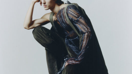 Aleksandr Blinov photographed by Laura Blanco in a moody, sculptural editorial.