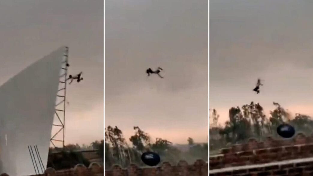 Man thrown into the air after roof is ripped off during storm in Andhra Pradesh, India.