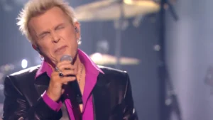 Billy Idol performing his three‑song medley after receiving the AMA Lifetime Achievement Award.