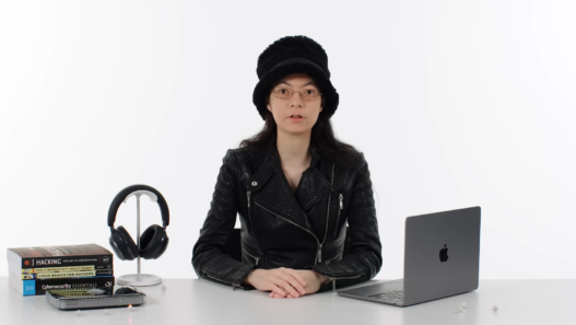 Cybersecurity researcher Allison Nixon wearing a fur hat and leather jacket on WIRED’s “Tech Support.”