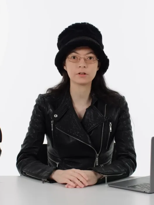 Cybersecurity researcher Allison Nixon wearing a fur hat and leather jacket on WIRED’s “Tech Support.”