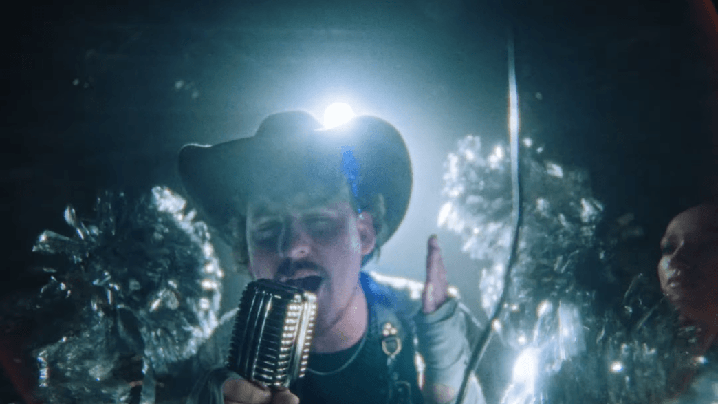 Fat Dog performing in the “Go Fuck Urself” music video inside a wrestling ring