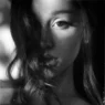 Ariana Grande shares a black‑and‑white teaser for her new single “Hate That I Made You Love Me.”