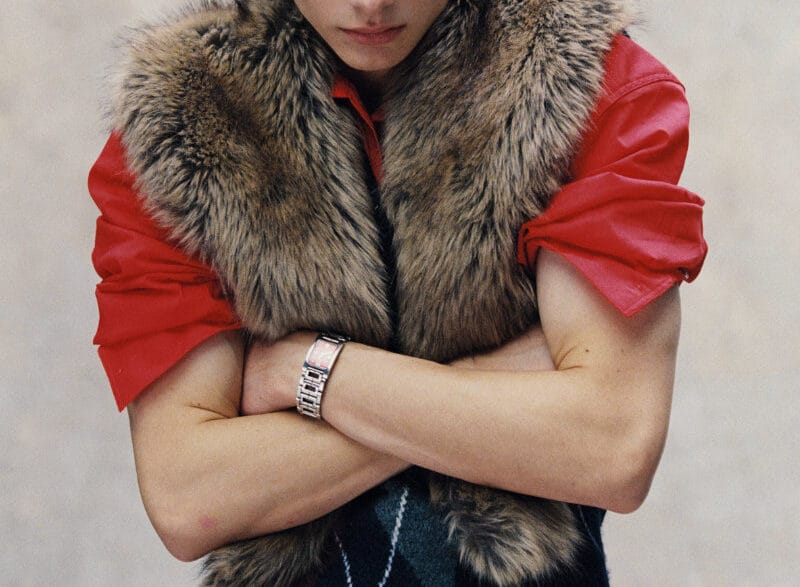 Juan Orghici posing in a cool‑toned portrait from the “Blue Blood” editorial shot by Fio Vicente.
