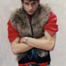Juan Orghici posing in a cool‑toned portrait from the “Blue Blood” editorial shot by Fio Vicente.