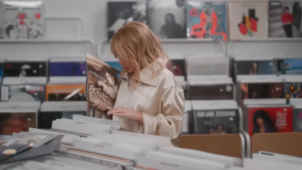 Kylie and Dannii Minogue choosing records during a Netflix record shopping segment