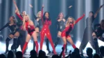 The Pussycat Dolls trio performing their AMAs medley with Busta Rhymes joining them onstage for “Don’t Cha.”