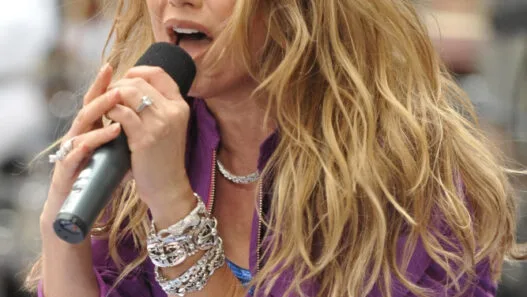 Fergie performing “Barracuda” on NBC Morning TV with high‑energy flips and rock theatrics