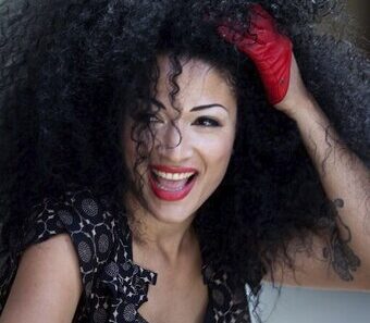 Dacia Bridges, co‑writer and original performer of “I Begin To Wonder,” the 2002 German dance hit later reimagined by Dannii Minogue