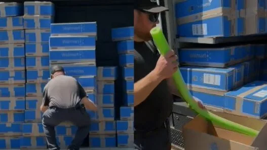 Man surrounded by dozens of Walmart boxes after receiving 240 pool noodles in separate shipments.