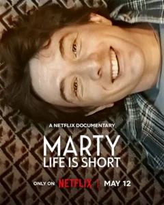 Netflix documentary poster showing a smiling man lying on a patterned rug, with the title 'MARTY LIFE IS SHORT' prominently displayed.