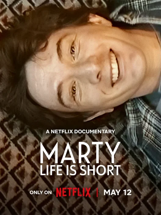 Netflix documentary poster showing a smiling man lying on a patterned rug, with the title 'MARTY LIFE IS SHORT' prominently displayed.