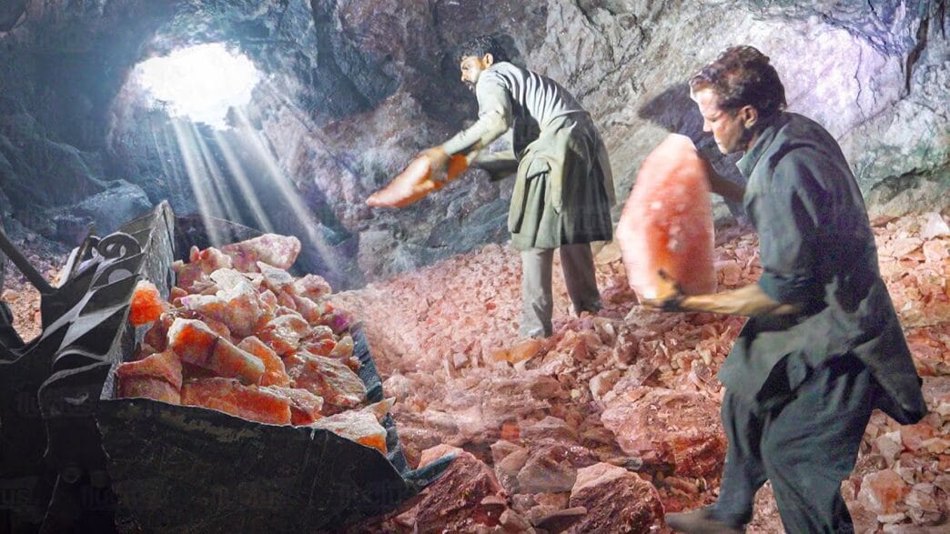 Workers mining Himalayan pink salt inside Pakistan’s Khewra salt mine.