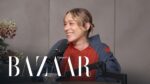 Woman smiling and speaking into a microphone during a podcast interview, with Harper's Bazaar logo overlaid.