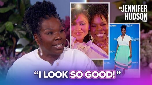 Black woman in a white blouse speaks on a talk-show set, with inset photos and the caption 'I LOOK SO GOOD!'