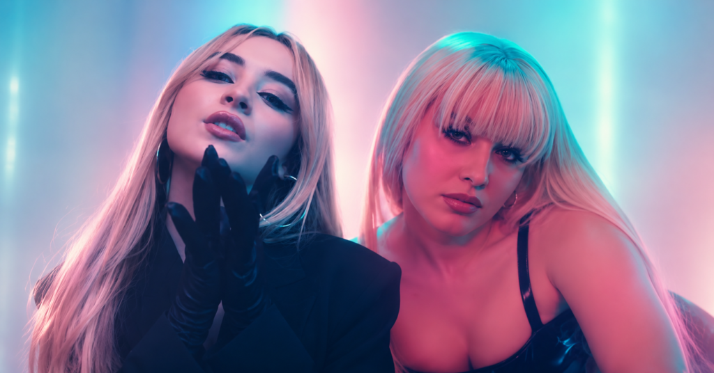 Zara Larsson and Sabrina Carpenter posed together in a neon pink and blue pop-video inspired header image for their “WOW” remix collaboration.