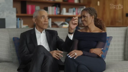 Barack Obama and Michelle Obama sitting together during their PEOPLE interview about marriage, family and life after the White House.