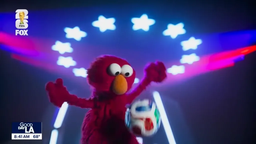Elmo and Cookie Monster arrive at FOX 11 Los Angeles for a World Cup television segment