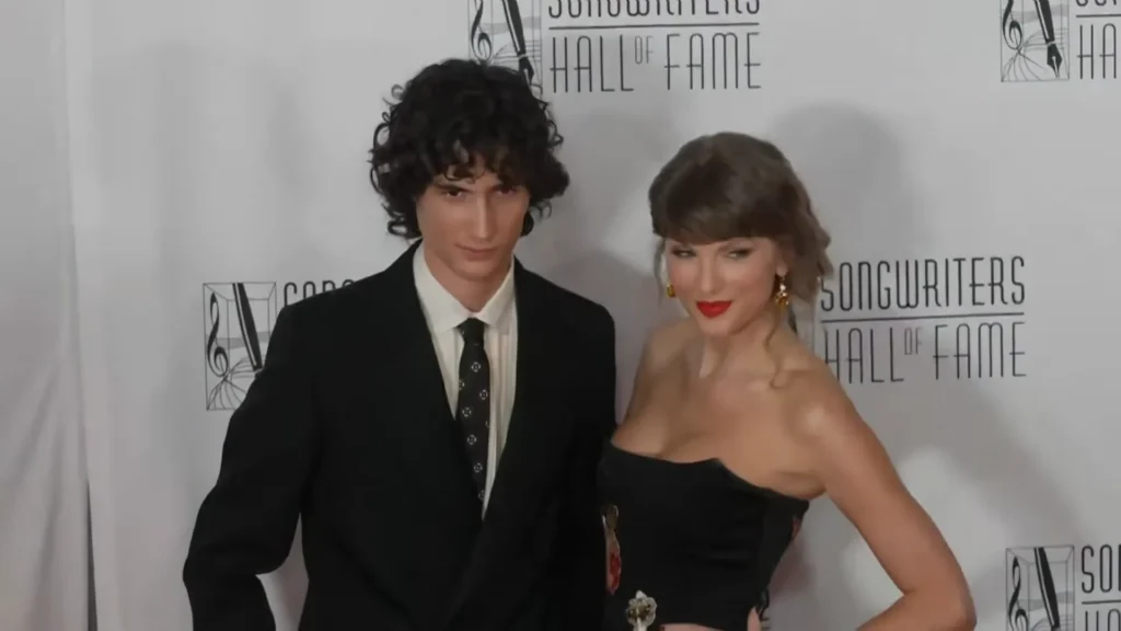 Taylor Swift smiling during the 2026 Songwriters Hall of Fame red carpet