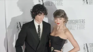 Taylor Swift and Sombr attending the 2026 Songwriters Hall of Fame red carpet in New York City