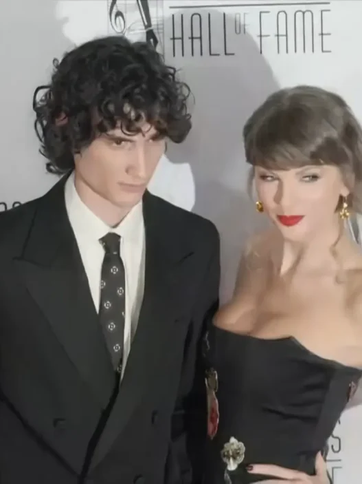 Taylor Swift and Sombr attending the 2026 Songwriters Hall of Fame red carpet in New York City