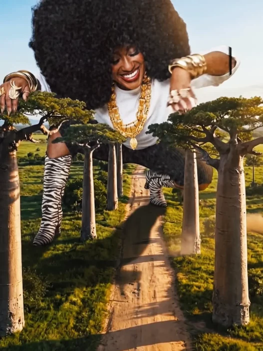 Rapsody in the “God Gotta Afro” music video featuring Karabo Ya Morena.